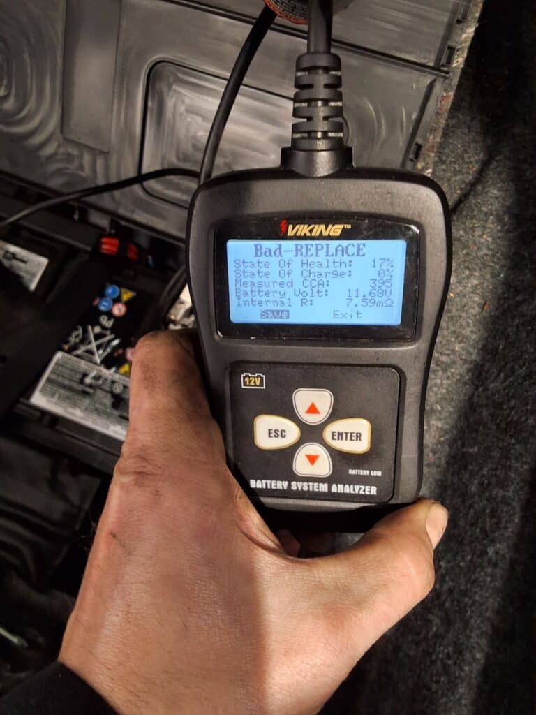 Battery tester showing a failed battery test result on an Audi Q5.