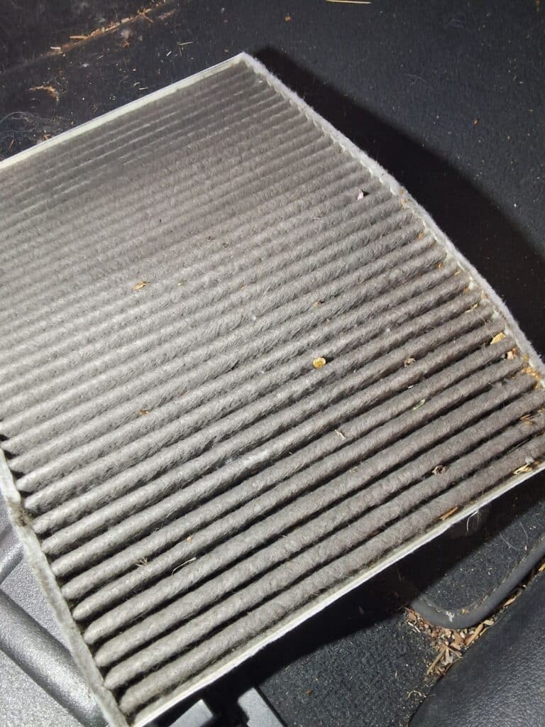Dirty cabin air filter removed from an Audi Q5.