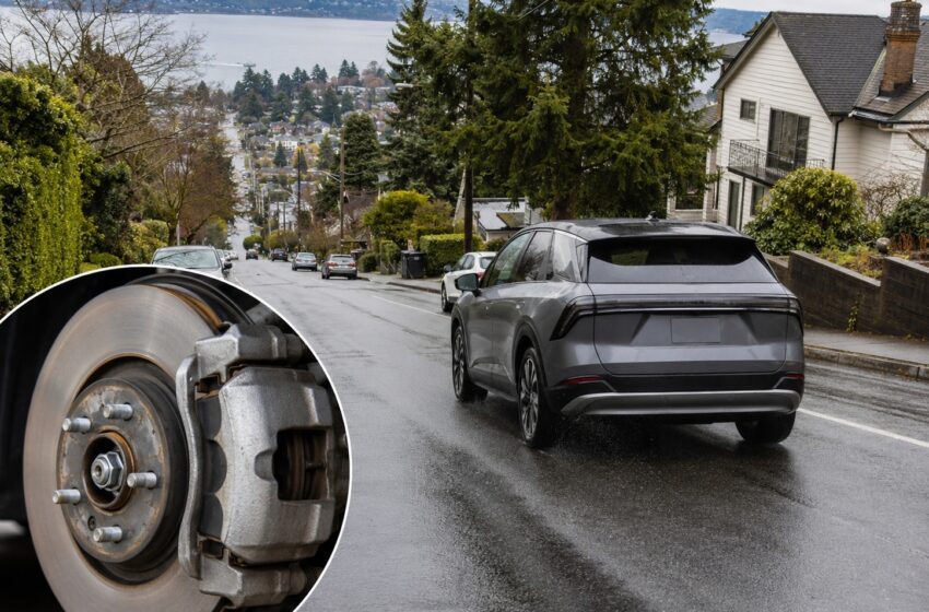 Hybrid or electric vehicle descending a wet Magnolia hill with an inset showing light corrosion on a disc brake rotor.