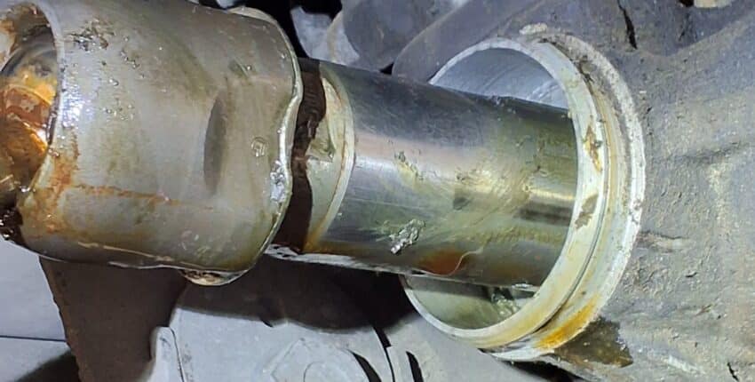 Inner tie rod inspected for excessive steering play on a Toyota 4Runner.