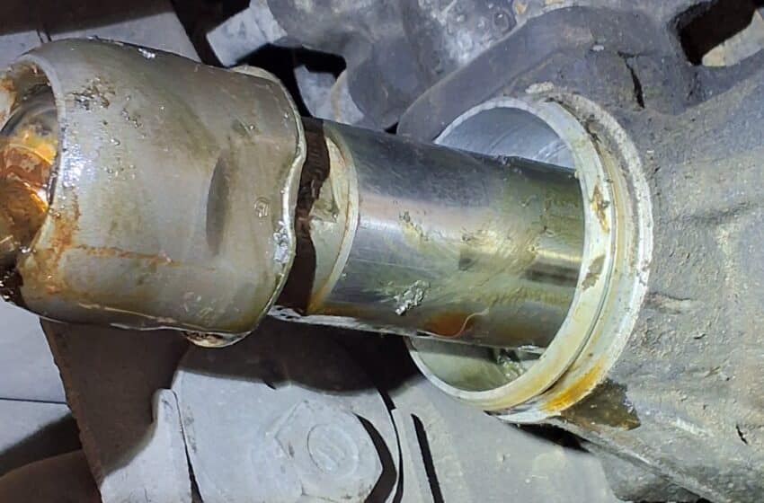 Inner tie rod inspected for excessive steering play on a Toyota 4Runner.
