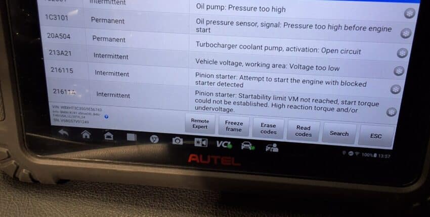 Technician performing engine performance diagnosis at 34th Street Garage in Seattle.