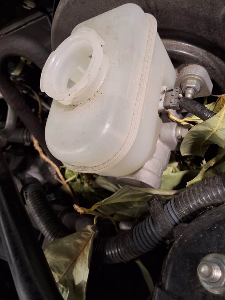 Brake fluid reservoir found empty during inspection of a Scion FR-S.
