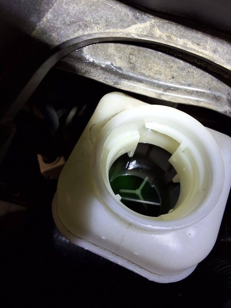 Brake fluid condition checked during a Toyota Corolla bumper to bumper inspection.